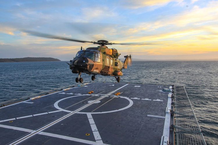 The MV Sycamore conducting helicopter landing exercises off the NSW coast