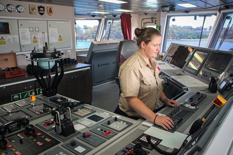 Port Authority cadet Amelia on the helm of the MV Sycamore