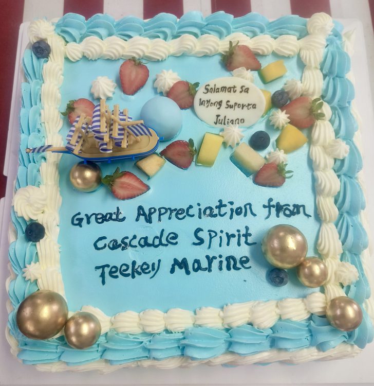 a light blue cake that says Great Appreciation from Cascade Spirit