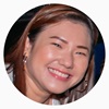 jocelyn smiling with light brown highlights on her hair