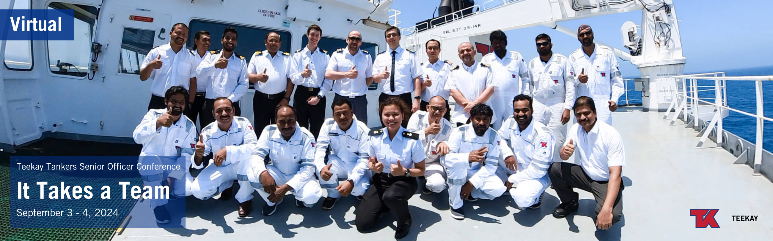 ship team in uniform on deck smiling with their thumbs up