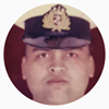 close up of a man with an officer's hat