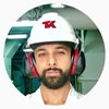 bearded man in a Teekay helmet