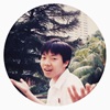 a young boy lifting his palms up