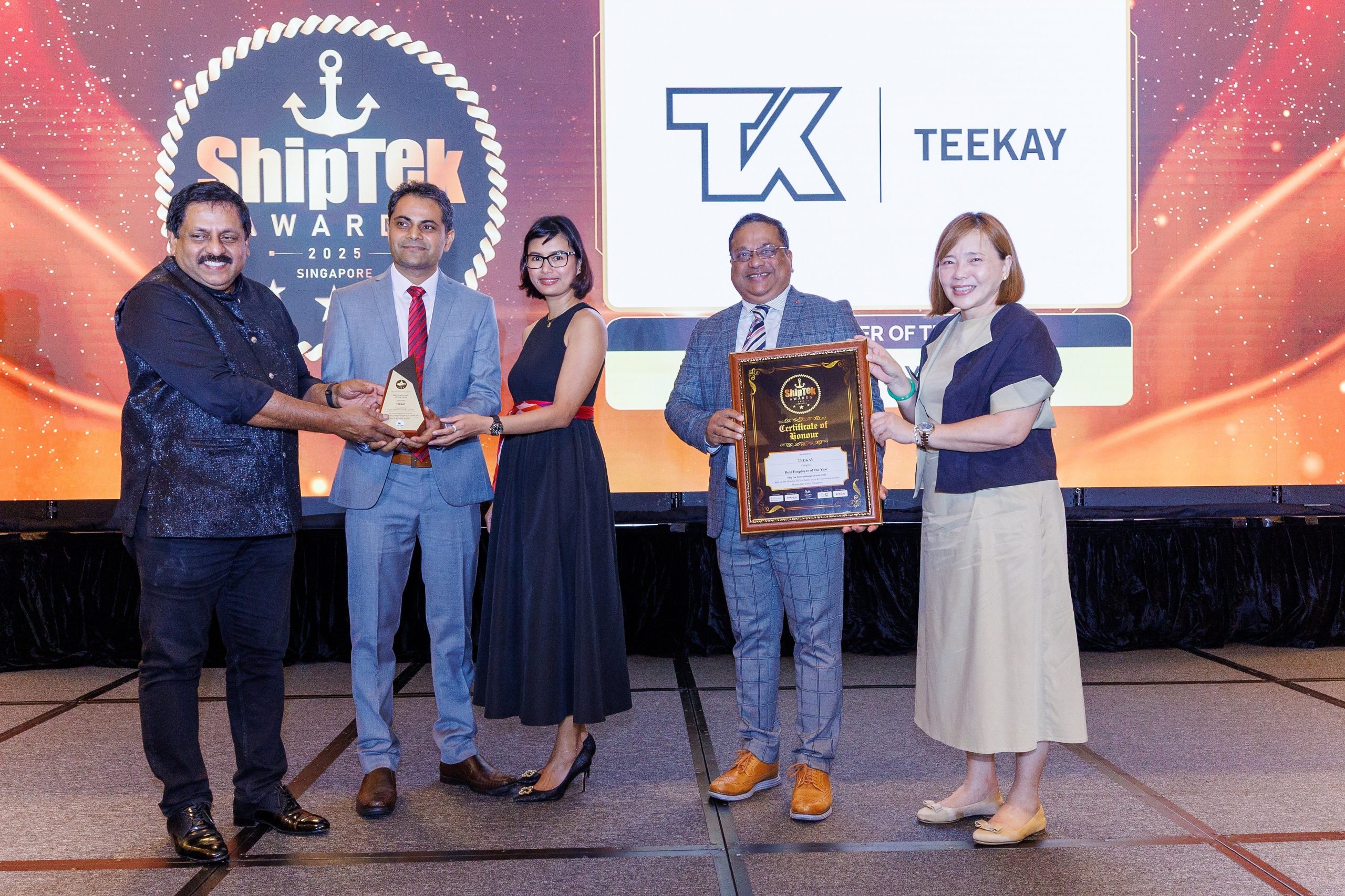 Our Teekay representatives receive the award onstage