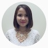 a lady with short hair smiling